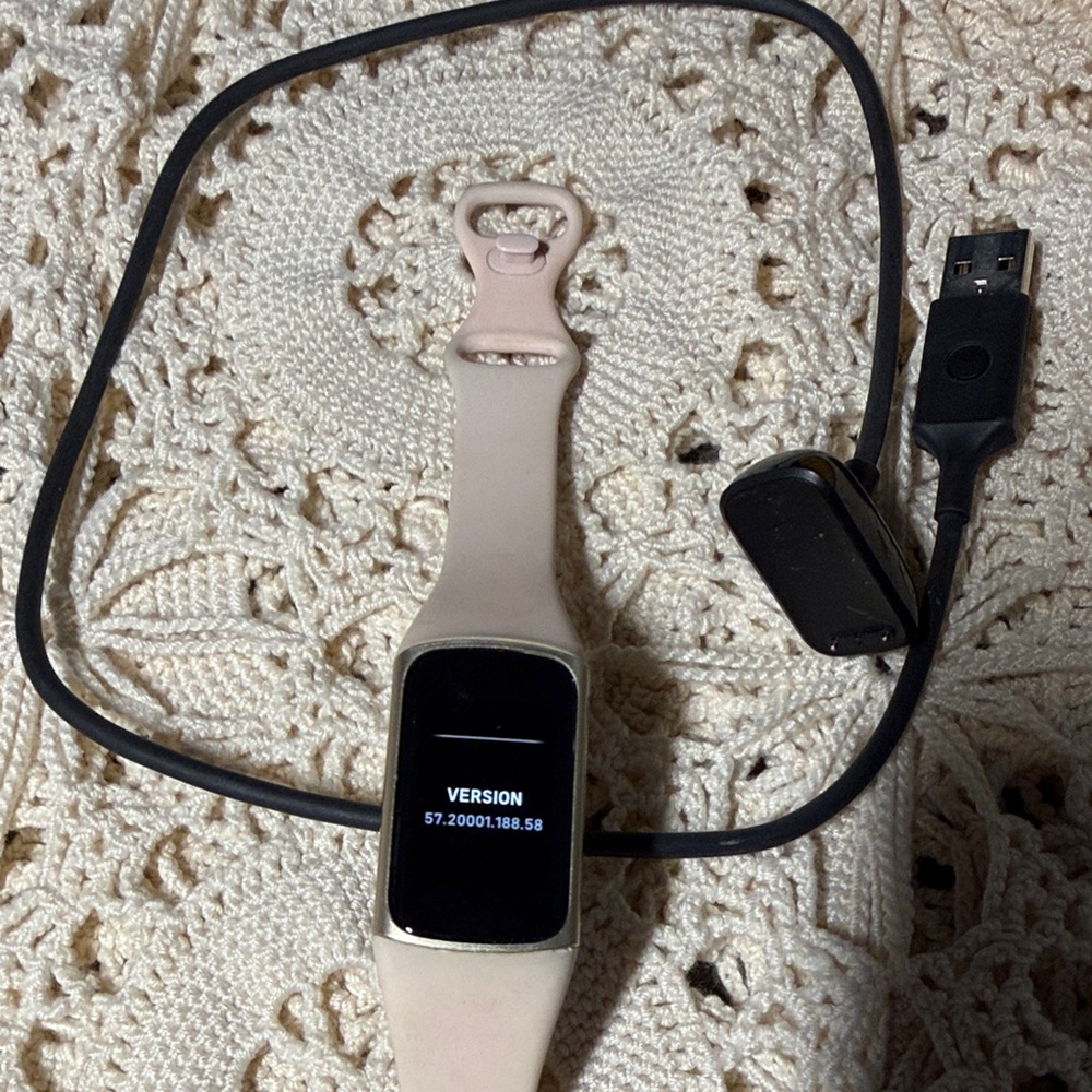 Elegant Fitbit Smartwatch (charge 5) with pink Band